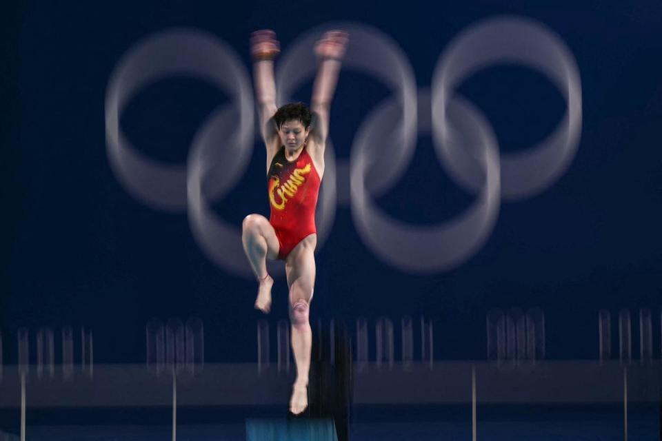 运动员在跳水比赛中拿下金牌(运动员在跳水比赛中拿下金牌犯规吗)